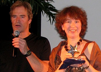 Le comédien Guy Richer et Michèle Grenier directrice ventes de Vacances Signature Le comédien Guy Richer et Michèle Grenier directrice ventes de Vacances Signature