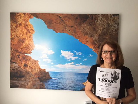 Agente de voyages et septième gagnante des points de Récompenses Fidélité, Hélène Thibault Agente de voyages et septième gagnante des points de Récompenses Fidélité, Hélène Thibault