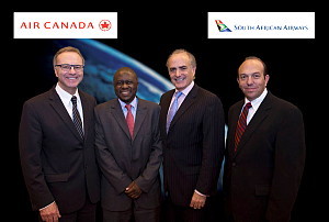 De gauche à droite : Yves Dufresne, vice-président – Alliances et Affaires réglementaires, Air Canada; Vuyisile Kona, chef de la direction de SAA; Calin Rovinescu, président et chef de la direction d'Air Canada; et Marc Cavaliere, responsable de l'Expansion des ventes et des Alliances mondiales à SAA De gauche à droite : Yves Dufresne, vice-président – Alliances et Affaires réglementaires, Air Canada; Vuyisile Kona, chef de la direction de SAA; Calin Rovinescu, président et chef de la direction d'Air Canada; et Marc Cavaliere, responsable de l'Expansion des ventes et des Alliances mondiales à SAA