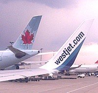 Nouveaux records d'achalandage chez WestJet et Air Canada  Nouveaux records d'achalandage chez WestJet et Air Canada